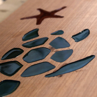 Rebaixos artísticos em formato de tartaruga e estrela do mar